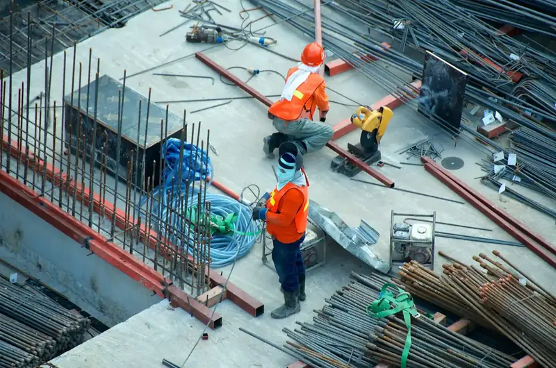 Crew assembling modular structure on site — module set and install